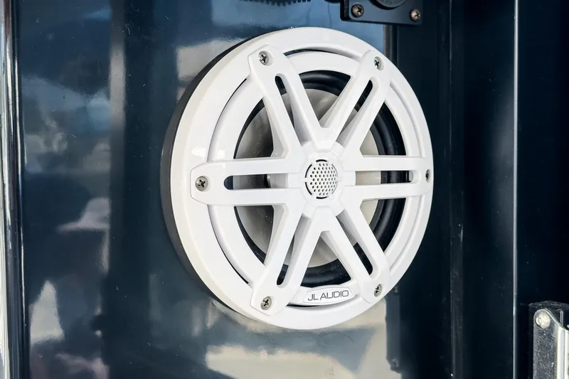 Slide: The Image of White JL Audio speaker on 2020 Four Winns Vista 355 Coupe OB boat. - 59