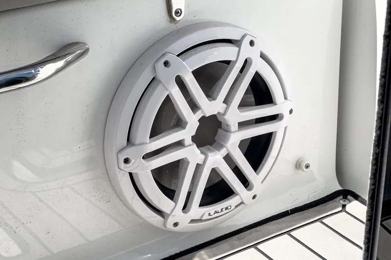 Slide: The Image of White JL Audio speaker on 2020 Four Winns Vista 355 Coupe OB boat. - 62