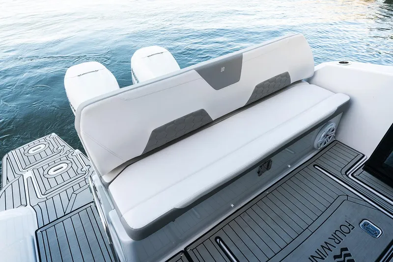 Slide: The Image of Manufacturer Provided Image: 2020 Four Winns Vista 355 Coupe OB boat with rear seating and twin outboard engines. - 66