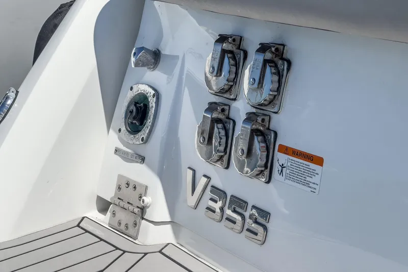 Slide: The Image of 2020 Four Winns Vista 355 Coupe OB boat stern with V355 emblem and hardware. - 70