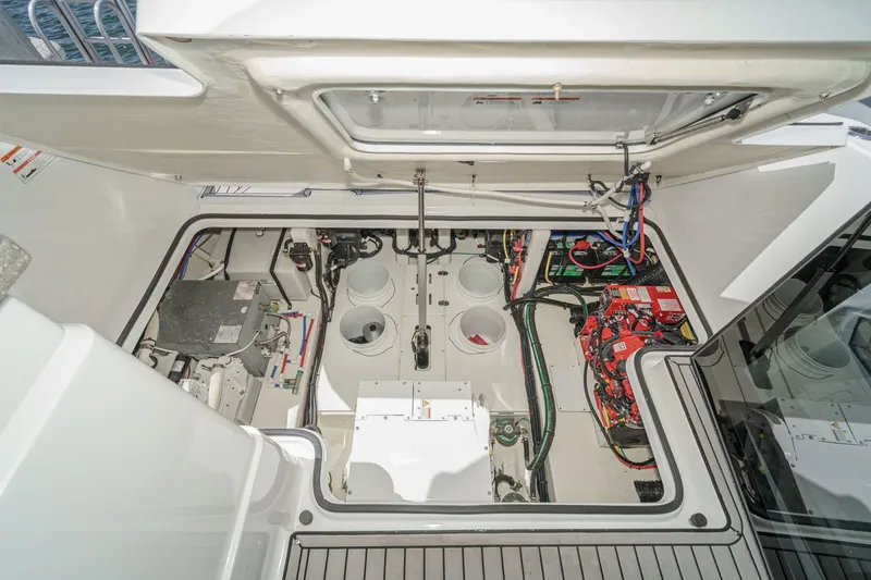 Slide: The Image of 2020 Four Winns Vista 355 Coupe OB engine compartment with wiring and components. - 71