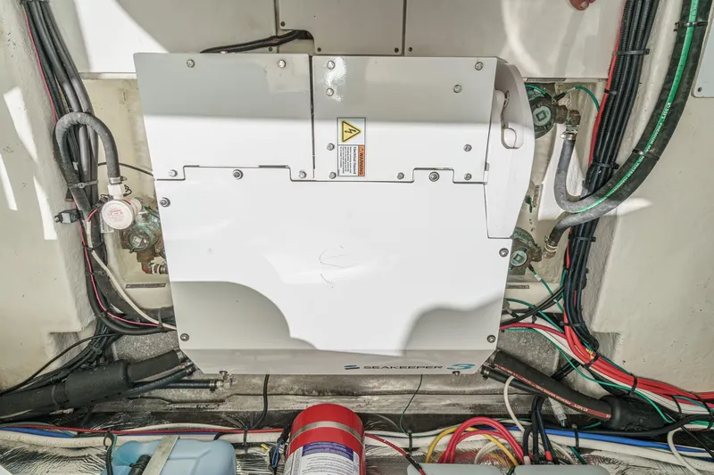 Slide: The Image of Engine compartment of 2020 Four Winns Vista 355 Coupe OB with wiring and equipment. - 72