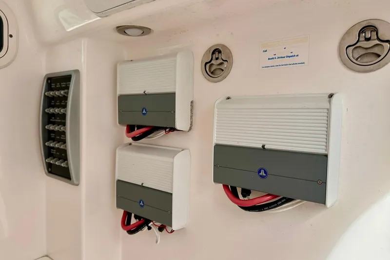 Slide: The Image of 2013 Everglades 325 Center Console electrical panel with wiring and components. - 29