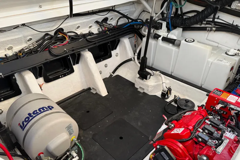 Slide: The Image of Engine compartment of 2022 Monterey 385SS Super Sport boat with visible components and wiring. - 34