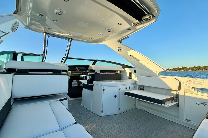 Slide: The Image of 2022 Monterey 385SS Super Sport boat interior with luxurious seating and modern design. - 11