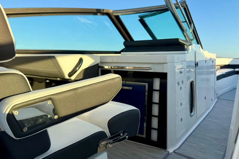 Slide: The Image of 2022 Monterey 385SS Super Sport boat interior with sleek seating and modern design. - 15