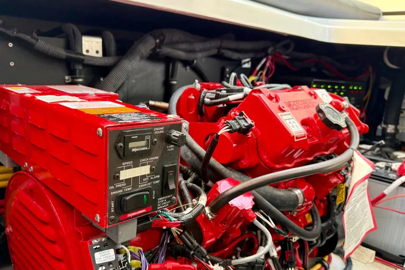 Slide: The Image of Engine compartment of a 2022 Monterey 385SS Super Sport, featuring vibrant red components. - 35