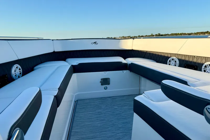 Slide: The Image of Interior view of 2022 Monterey 385SS Super Sport boat with luxurious seating. - 5