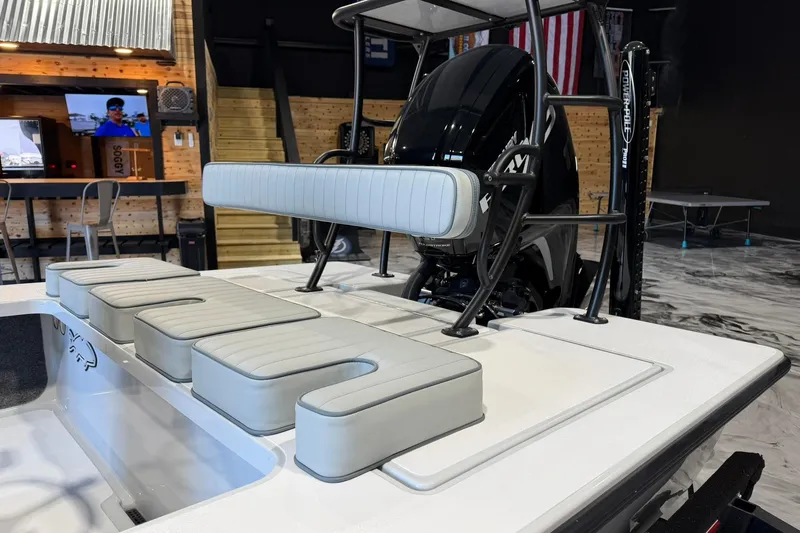 Slide: The Image of 2026 Hell's Bay Marquesa boat interior with cushioned seating and modern design. - 5