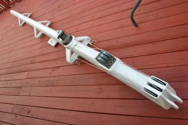 Slide: The Image of Hughes 40 sailboat mast on wooden deck, 2012 model. - 10