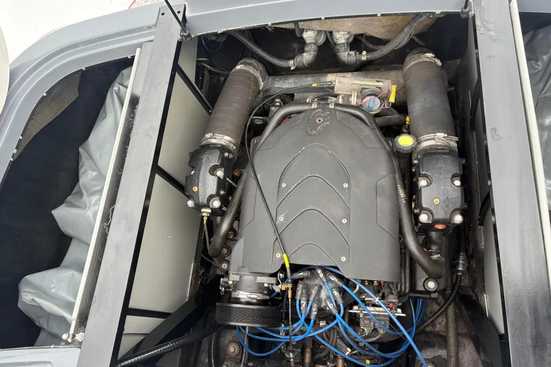 Slide: The Image of 2006 Centurion Enzo SV230 engine compartment with visible components and wiring. - 14