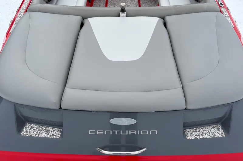 Slide: The Image of 2006 Centurion Enzo SV230 boat interior with gray seating and Centurion logo. - 4