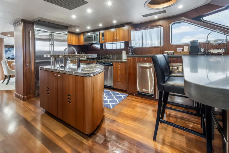 Slide: The Image of Luxurious dining area on 2012 Cheoy Lee 84 Bravo yacht with elegant furnishings. - 13