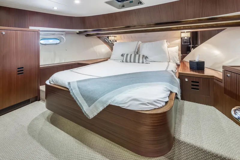Slide: The Image of Laundry area with stacked washer and dryer on 2012 Cheoy Lee 84 Bravo yacht. - 18