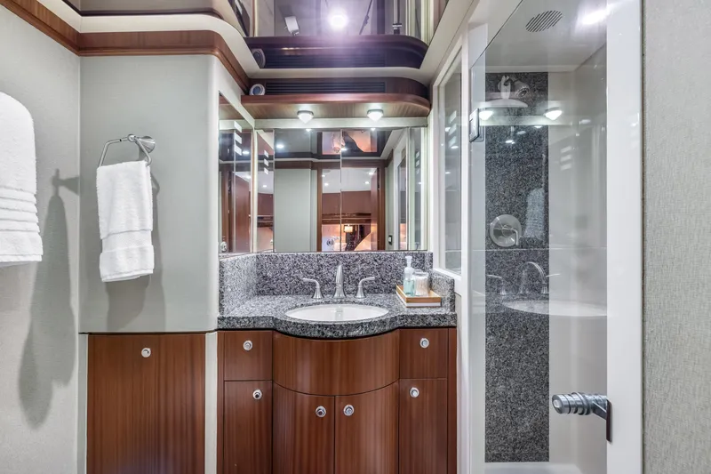 Slide: The Image of Luxurious bedroom interior of 2012 Cheoy Lee 84 Bravo yacht with elegant wood finish. - 19