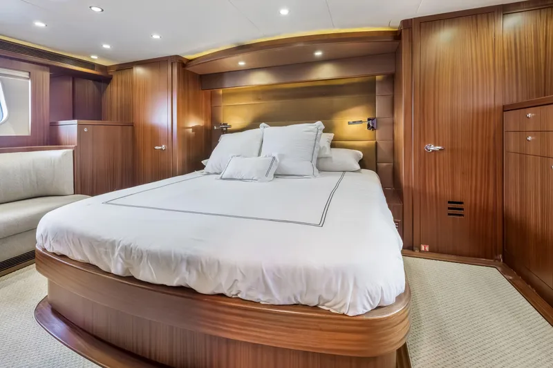 Slide: The Image of Luxurious interior hallway of 2012 Cheoy Lee 84 Bravo yacht, featuring elegant wood paneling. - 22