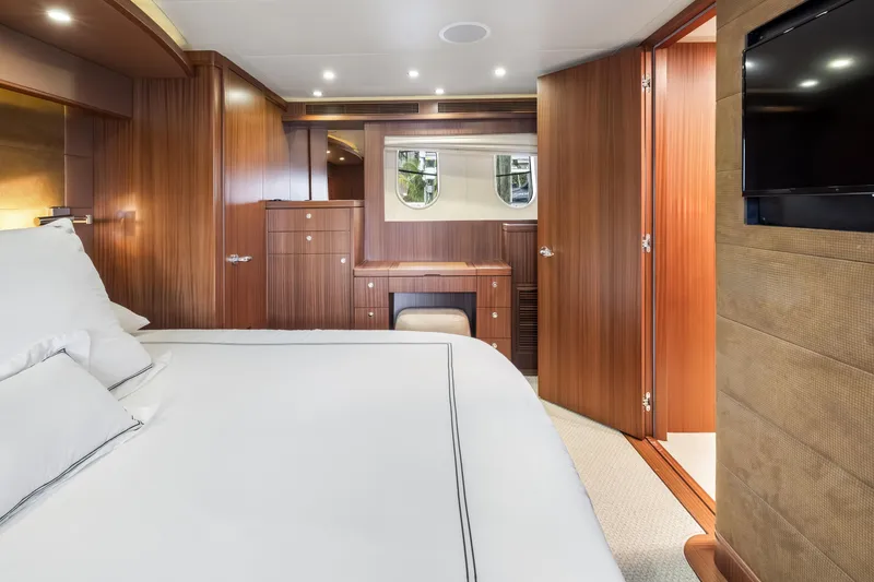 Slide: The Image of Luxurious bedroom interior on 2012 Cheoy Lee 84 Bravo yacht with elegant wood finish. - 24