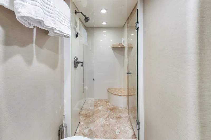 Slide: The Image of Luxurious bedroom interior of 2012 Cheoy Lee 84 Bravo yacht with wood paneling and TV. - 32