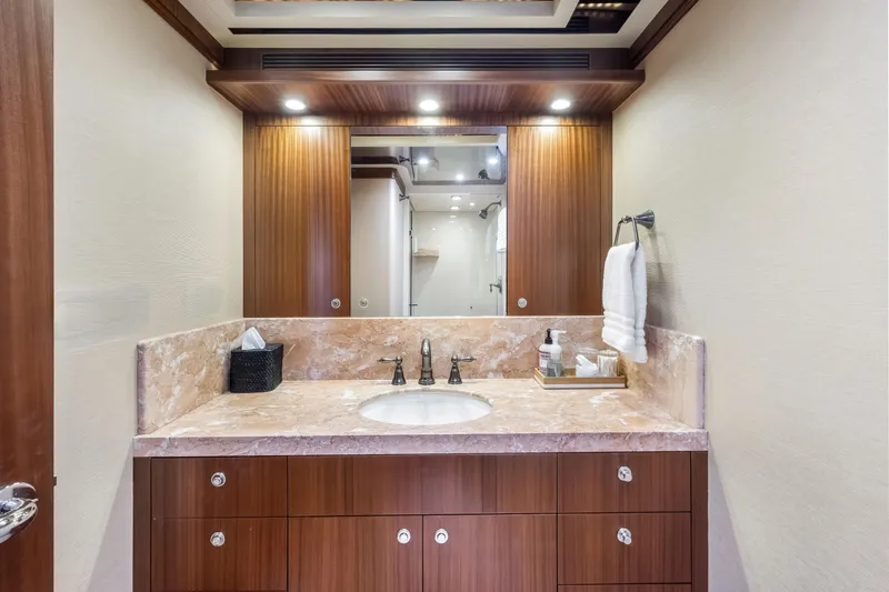 Slide: The Image of Luxurious shower in 2012 Cheoy Lee 84 Bravo yacht with marble accents and glass door. - 33