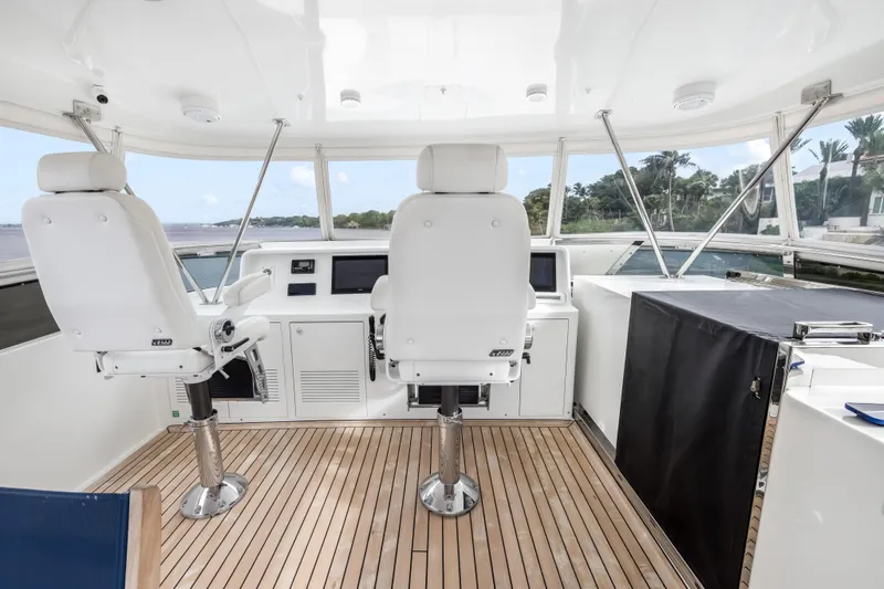 Slide: The Image of Luxurious 2012 Cheoy Lee 84 Bravo yacht interior with elegant seating and dining area. - 43