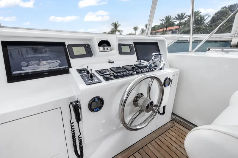 Slide: The Image of Interior helm of 2012 Cheoy Lee 84 Bravo yacht with dual captain chairs. - 44