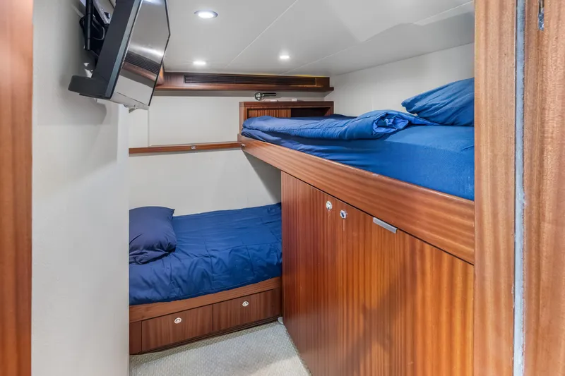 Slide: The Image of Interior of 2012 Cheoy Lee 84 Bravo yacht with cozy seating and modern amenities. - 48