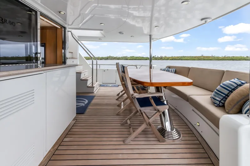 Slide: The Image of Spacious deck of 2012 Cheoy Lee 84 Bravo yacht, featuring sleek design and modern amenities. - 5