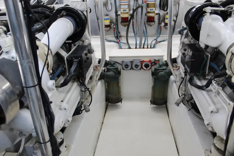 Slide: The Image of Engine room of 2003 Ocean Yachts 65 Odyssey, showcasing mechanical components and systems. - 101