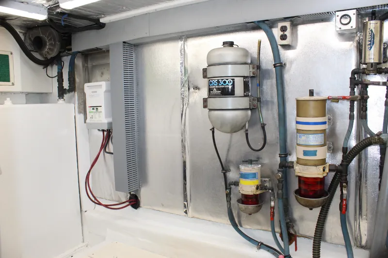 Slide: The Image of Engine room of 2003 Ocean Yachts 65 Odyssey, featuring CRS 300 system and various components. - 107