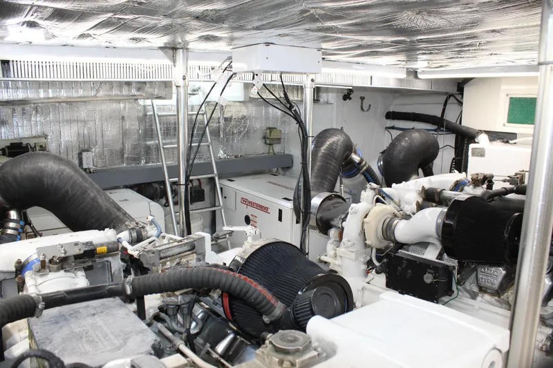 Slide: The Image of Engine room of 2003 Ocean Yachts 65 Odyssey, featuring complex machinery and equipment. - 109
