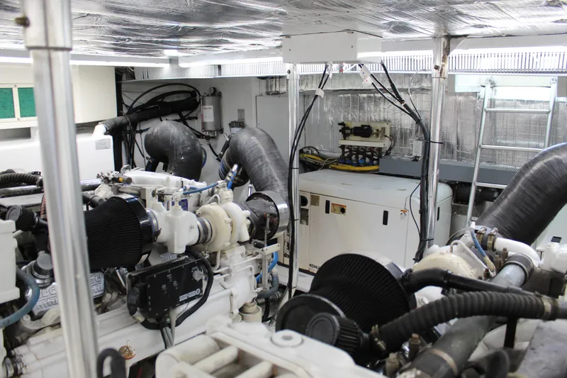 Slide: The Image of Engine room of 2003 Ocean Yachts 65 Odyssey, featuring machinery and equipment. - 110