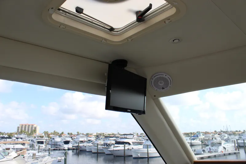 Slide: The Image of Interior view of 2003 Ocean Yachts 65 Odyssey with marina backdrop. - 55