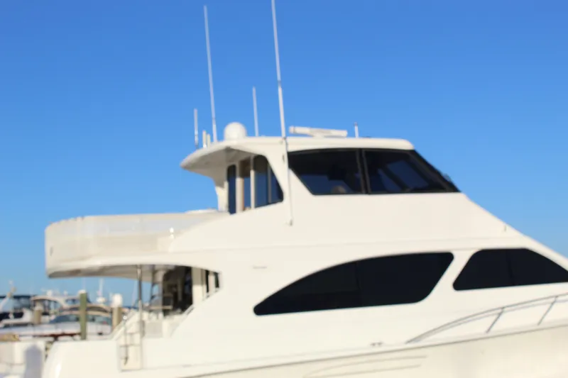 Slide: The Image of 2003 Ocean Yachts 65 Odyssey against clear blue sky. - 6