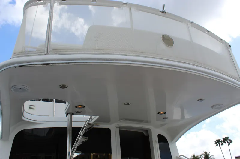 Slide: The Image of 2003 Ocean Yachts 65 Odyssey yacht deck with railing and overhead lights. - 89