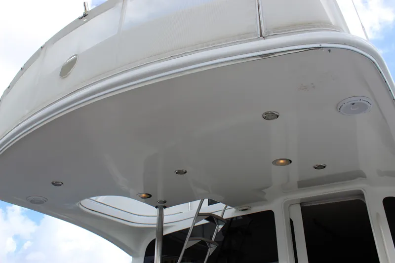 Slide: The Image of 2003 Ocean Yachts 65 Odyssey yacht deck with lighting and stairs. - 90