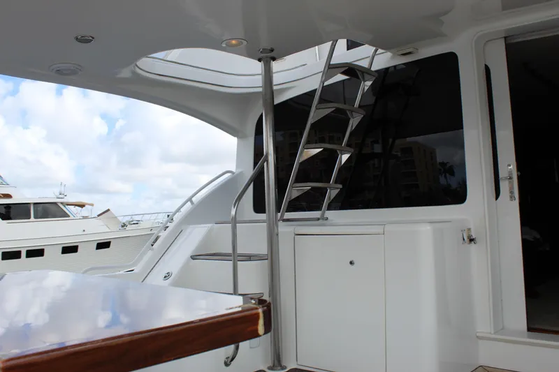 Slide: The Image of 2003 Ocean Yachts 65 Odyssey yacht interior with ladder and sleek design. - 91