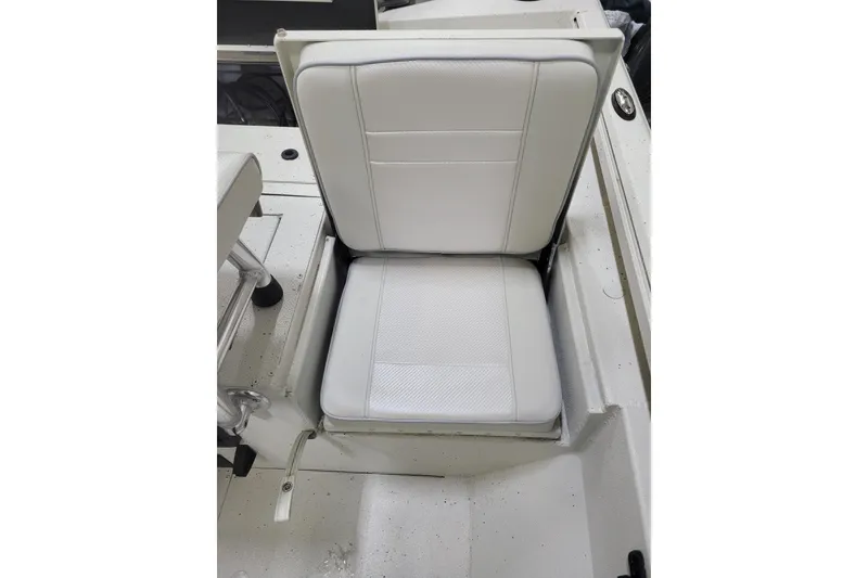 Slide: The Image of 2024 Ranger RB210 boat seat, white upholstery, sleek design. - 11