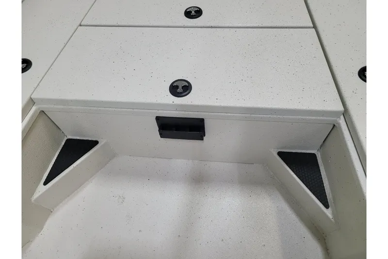 Slide: The Image of 2024 Ranger RB210 boat deck with storage compartments and non-slip surfaces. - 12