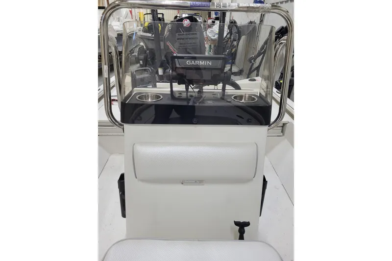 Slide: The Image of 2024 Ranger RB210 boat console with Garmin navigation system and cup holders. - 13
