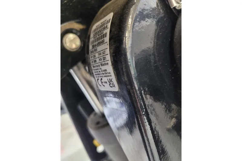 Slide: The Image of Close-up of a 2024 Ranger RB210 engine label with specifications and certifications. - 25