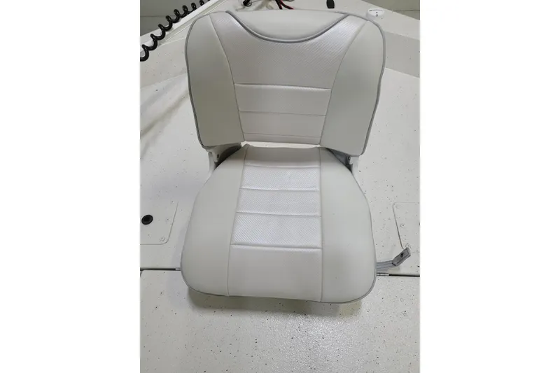 Slide: The Image of White seat in 2024 Ranger RB210 boat interior. - 9