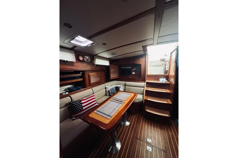 Slide: The Image of Interior of 2008 Sabre 38 Hard Top Express yacht with elegant wood finish and cozy seating. - 31
