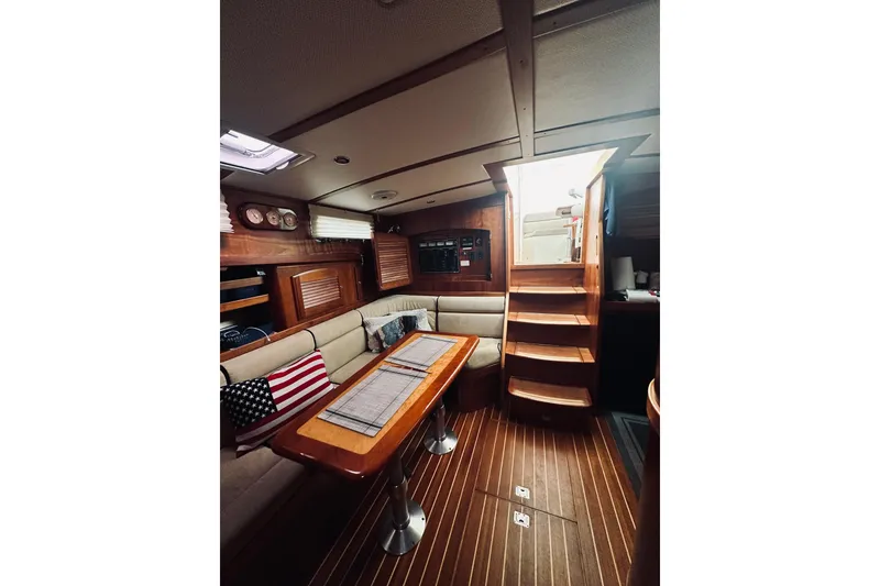 Slide: The Image of Interior of 2008 Sabre 38 Hard Top Express yacht with cozy seating and wooden finishes. - 32