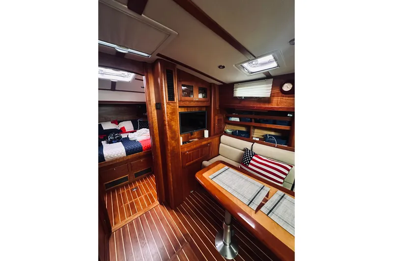 Slide: The Image of Interior of 2008 Sabre 38 Hard Top Express yacht with wooden cabinetry and modern amenities. - 33