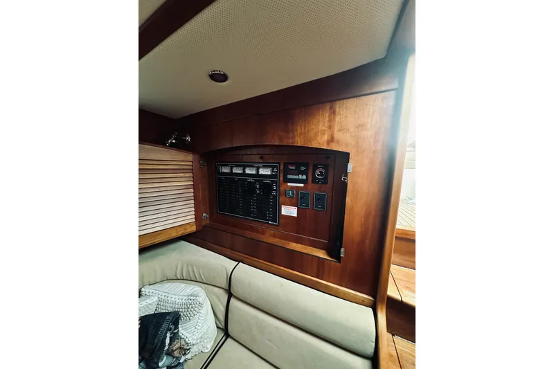 Slide: The Image of Interior of 2008 Sabre 38 Hard Top Express yacht with wooden finishes and seating area. - 35