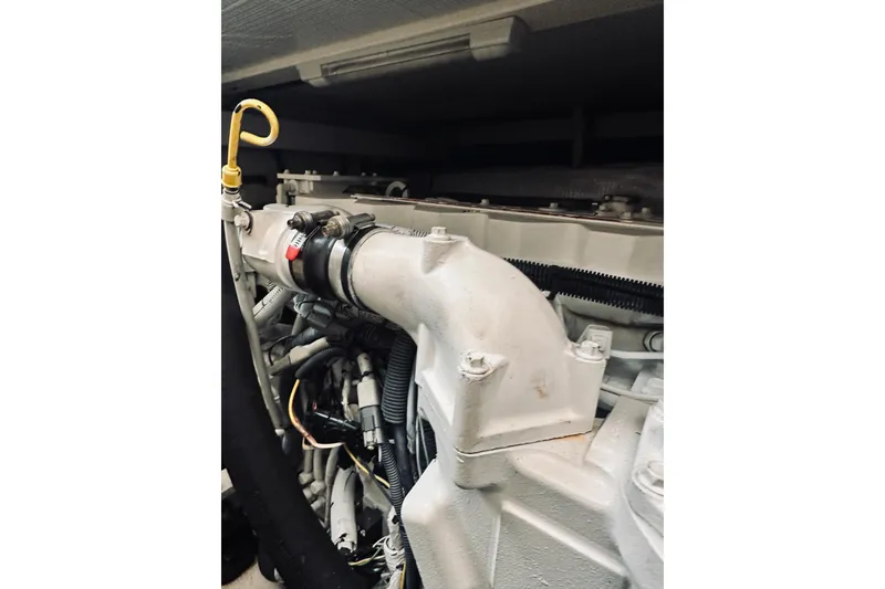 Slide: The Image of 2008 Sabre 38 Hard Top Express yacht interior kitchen with wood cabinetry and modern appliances. - 40