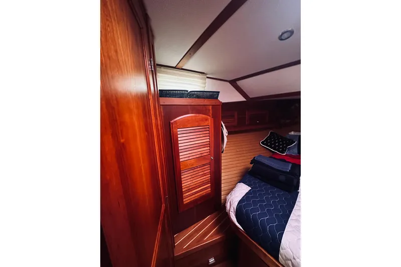 Slide: The Image of Interior of 2008 Sabre 38 Hard Top Express with wood paneling and beige seating. - 41