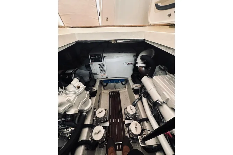 Slide: The Image of Interior cabin of 2008 Sabre 38 Hard Top Express with wooden cabinetry and cozy bedding. - 45