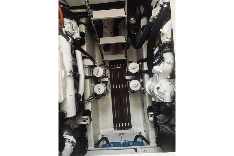 Slide: The Image of Engine room of 2008 Sabre 38 Hard Top Express with visible machinery and components. - 50