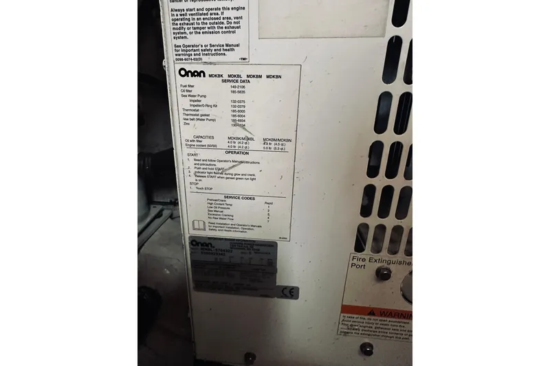 Slide: The Image of Engine compartment of 2008 Sabre 38 Hard Top Express boat. - 52